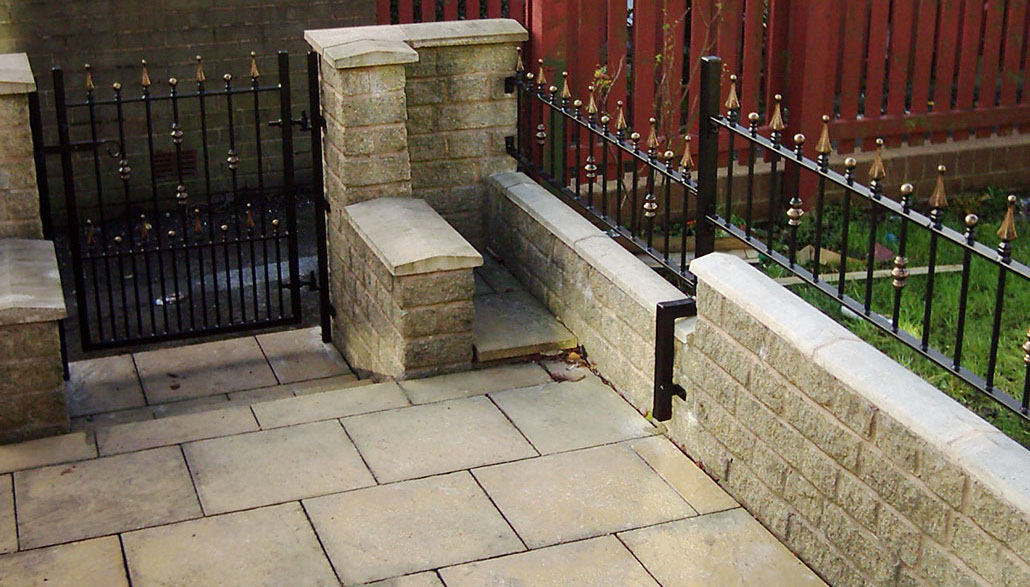 Small wrought iron garden gate and complimentary fencing Small wrought iron garden gate and complimentary fencing